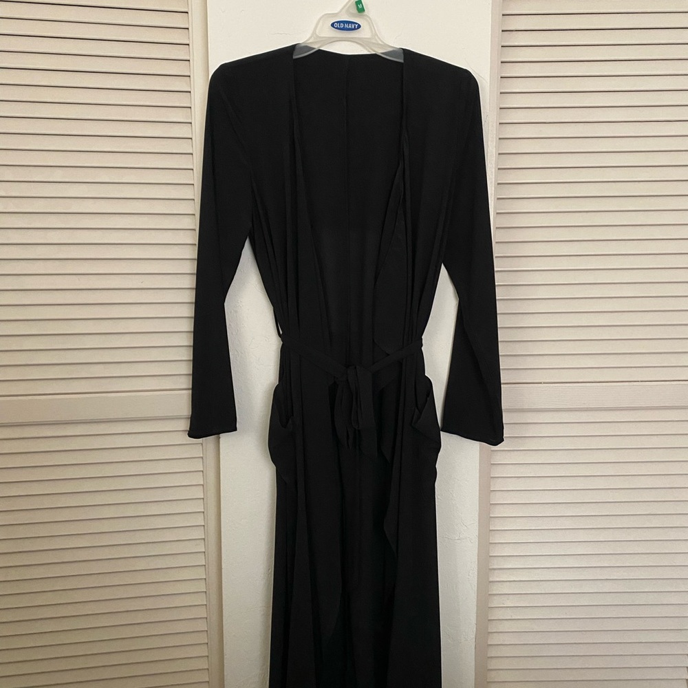 Sheer black duster in size Medium, never worn but no tags. It was too long on me